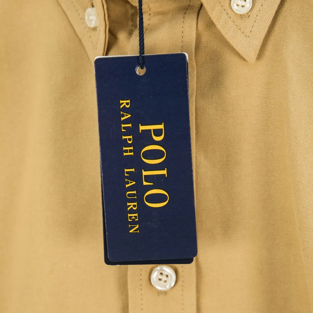 P270 zp version [Exclusive supply] Ralph Lauren/Ralph Lauren's classic evergreen single product 100 cotton Oxford spun old money style casual long-sleeved shirt. 100% restored workmanship. The entire garment is embedded with seams and clean edges. The upper back seams are reorganized for a better fit. ✅ 100 cotton Oxford spun on the face. Pre-wash treatment. The texture is tight and soft. ✅ Custom dyed original pearlescent white bottom buttons. Size partitions. ✅ Special shaped chiffon foil is included in the collar door tube. It is not easy to deform and pull. ✅ RL classic version of the Oxford shirt. The thick and crisp feeling brought by the Oxford cloth. It can be worn alone or as an outer layer. It can be worn in all seasons. It is a must-have item in the wardrobe. Get it with your eyes closed. Color: black, white, pink, blue, carbon gray, khaki, navy blue and red label, dark blue and white label (8 colors) Size: S M L XL Number: WW10973
